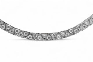 Close up photo of a choker necklace with white zirconias