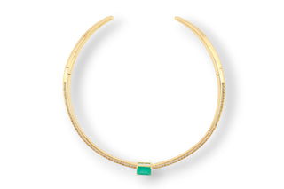 Gold choker necklace with zirconias and a green gemstone in the middle with white background